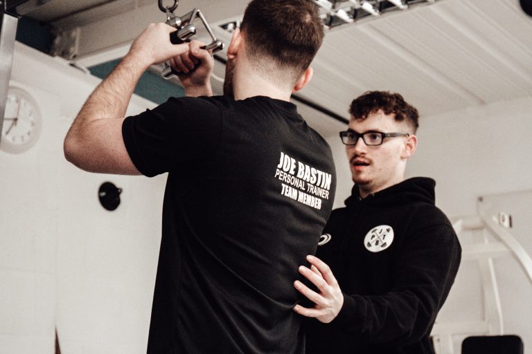 Fitness coach Basingstoke with a male client